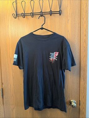 Men's Black Short-Sleeve Graphic Tee - Small Pocket Accent